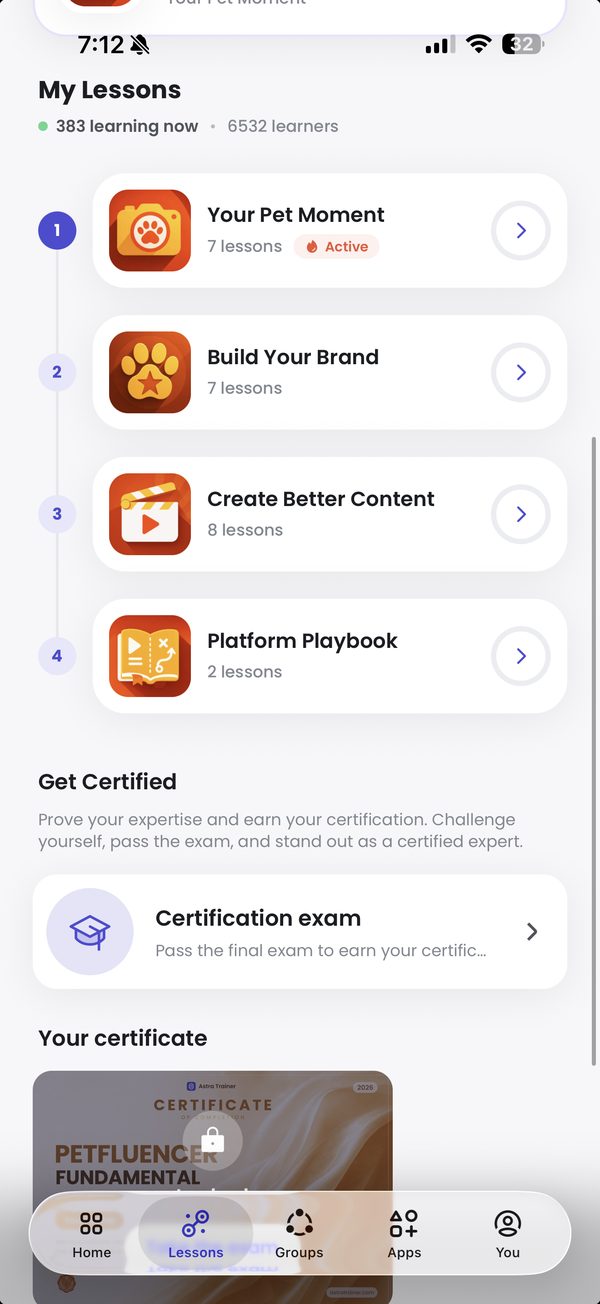 The My Lessons screen in the Astra Trainer app showing the four Petfluencer course modules — Your Pet Moment, Build Your Brand, Create Better Content, and Platform Playbook — with 6,532 learners and the certification section
